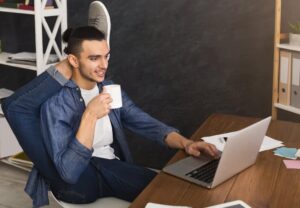 flexible staffing man sitting at desk